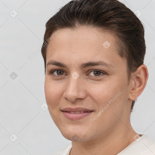 Joyful white young-adult female with short  brown hair and brown eyes