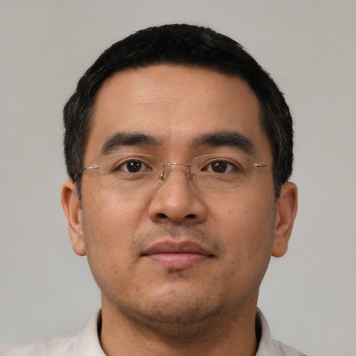 Neutral asian young-adult male with short  black hair and brown eyes