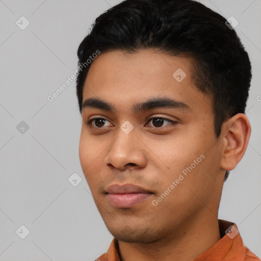 Neutral latino young-adult male with short  black hair and brown eyes