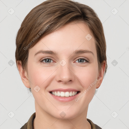 Joyful white young-adult female with short  brown hair and grey eyes