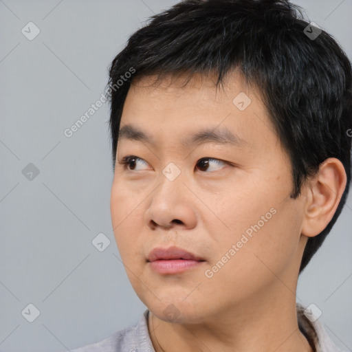 Neutral asian young-adult male with short  black hair and brown eyes