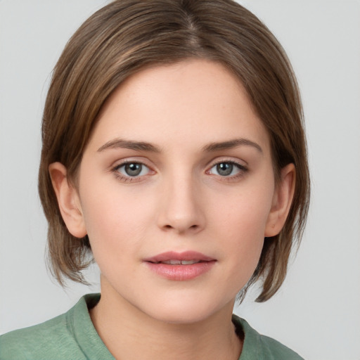 Neutral white young-adult female with medium  brown hair and grey eyes