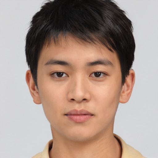 Neutral asian young-adult male with short  brown hair and brown eyes