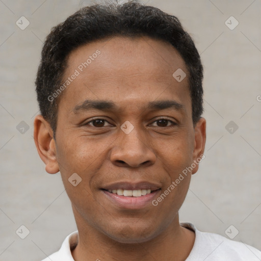 Joyful latino young-adult male with short  black hair and brown eyes