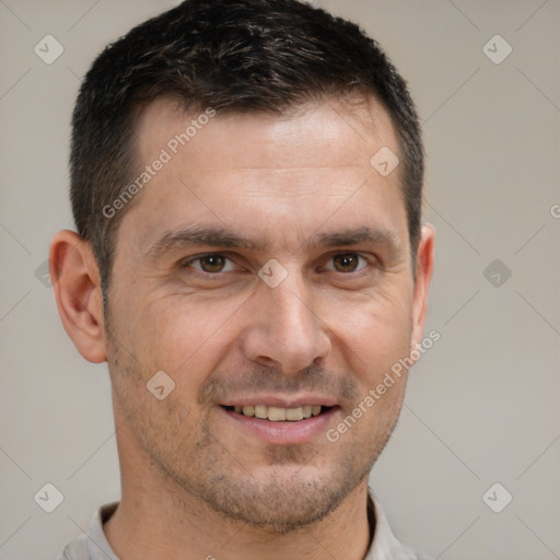 Joyful white adult male with short  brown hair and brown eyes