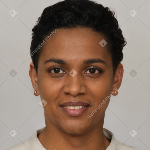 Joyful black young-adult female with short  black hair and brown eyes