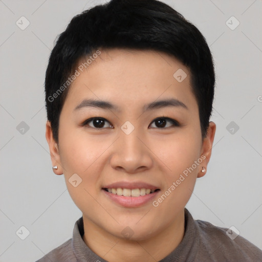 Joyful asian young-adult female with short  black hair and brown eyes