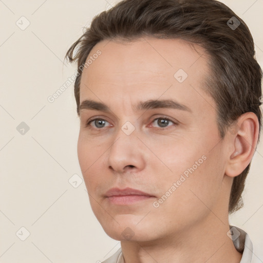 Neutral white young-adult male with short  brown hair and brown eyes