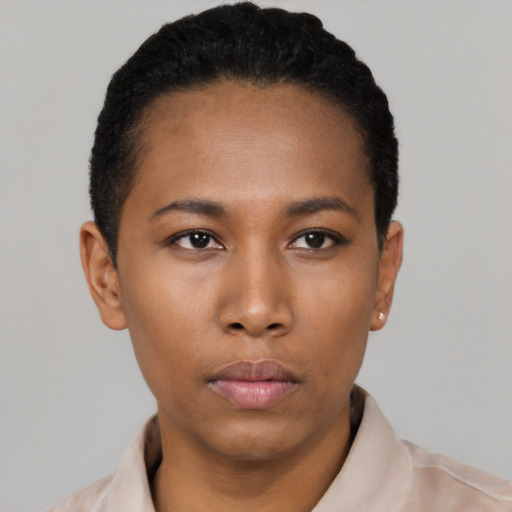 Neutral black young-adult female with short  black hair and brown eyes