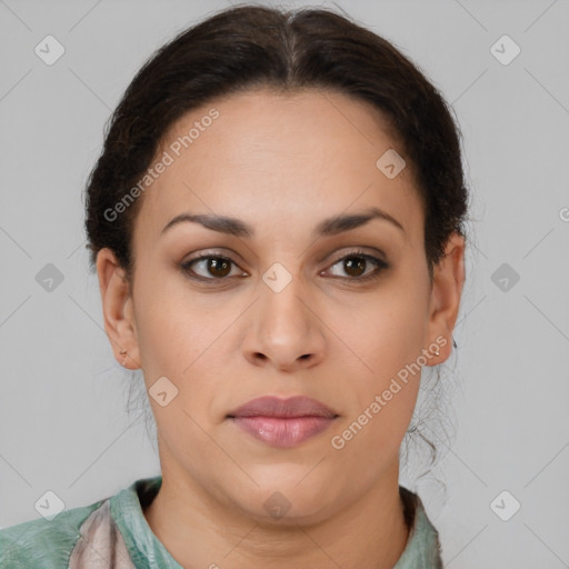 Joyful latino young-adult female with short  brown hair and brown eyes