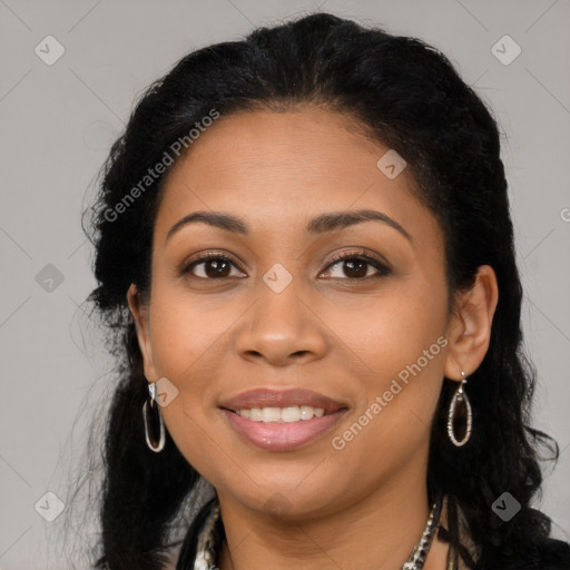 Joyful latino young-adult female with long  brown hair and brown eyes