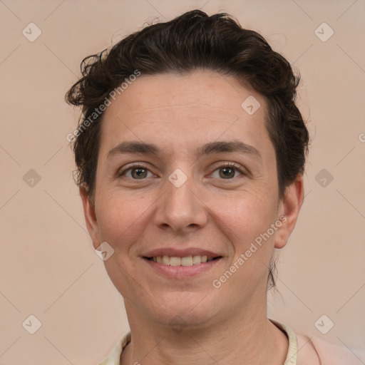 Joyful white adult female with short  brown hair and brown eyes