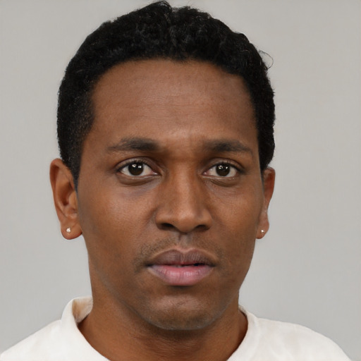 Neutral black young-adult male with short  black hair and brown eyes