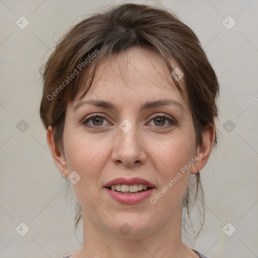 Joyful white adult female with medium  brown hair and grey eyes