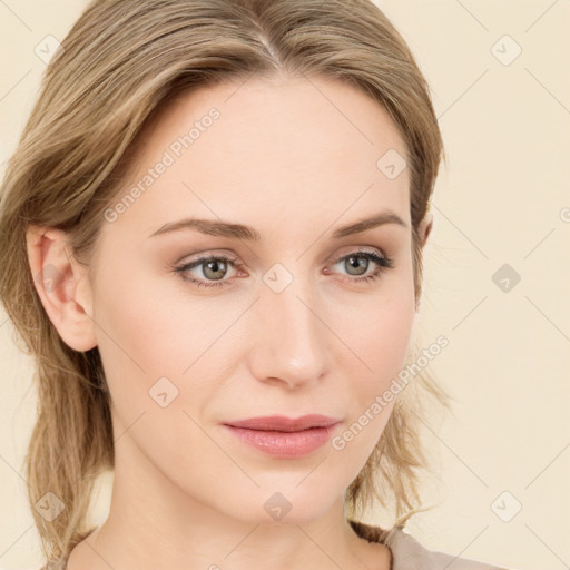 Joyful white young-adult female with medium  brown hair and green eyes