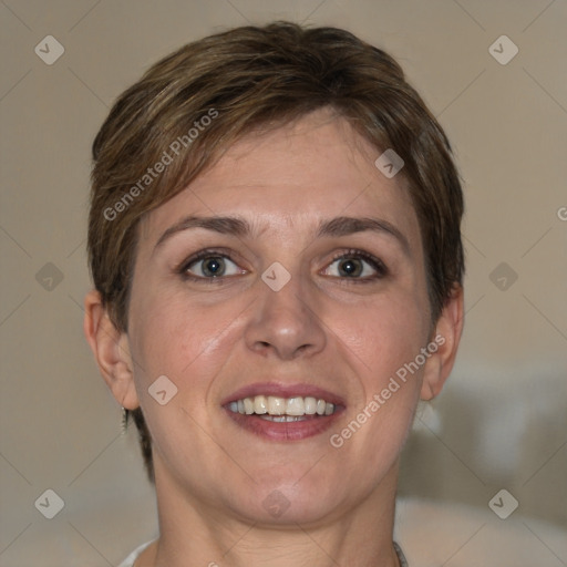 Joyful white adult female with short  brown hair and brown eyes