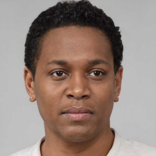 Neutral black young-adult male with short  brown hair and brown eyes
