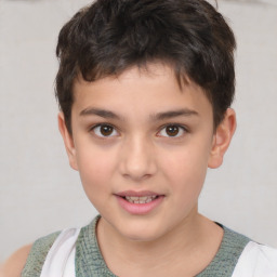 Joyful white child male with short  brown hair and brown eyes