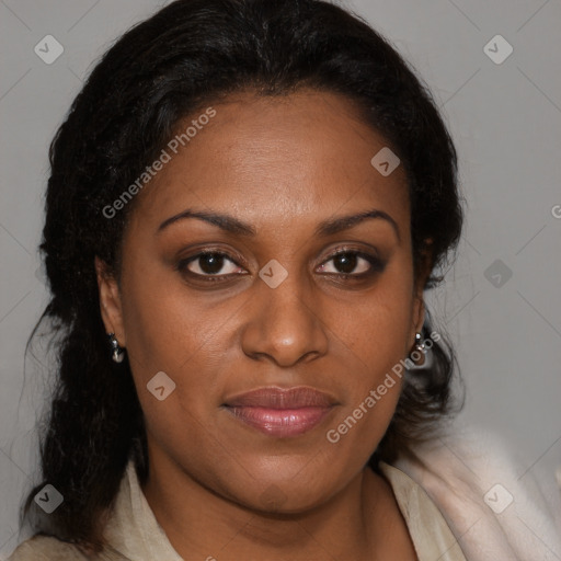 Joyful black adult female with medium  brown hair and brown eyes