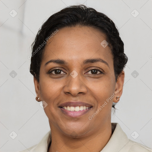 Joyful latino young-adult female with short  brown hair and brown eyes