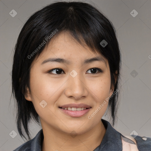 Joyful asian young-adult female with medium  black hair and brown eyes