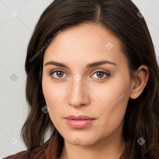 Neutral white young-adult female with long  brown hair and brown eyes