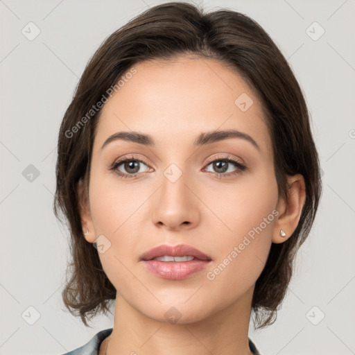 Neutral white young-adult female with medium  brown hair and brown eyes