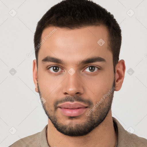 Neutral white young-adult male with short  brown hair and brown eyes