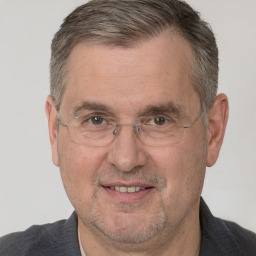 Joyful white middle-aged male with short  brown hair and brown eyes