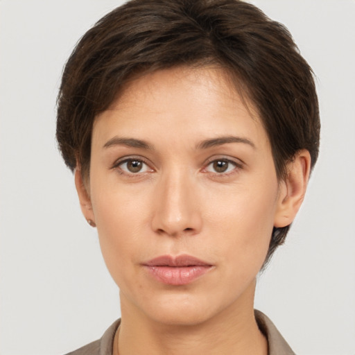 Neutral white young-adult female with short  brown hair and brown eyes