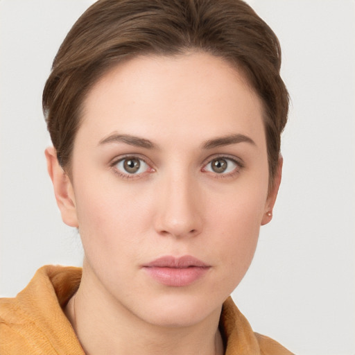 Neutral white young-adult female with short  brown hair and grey eyes