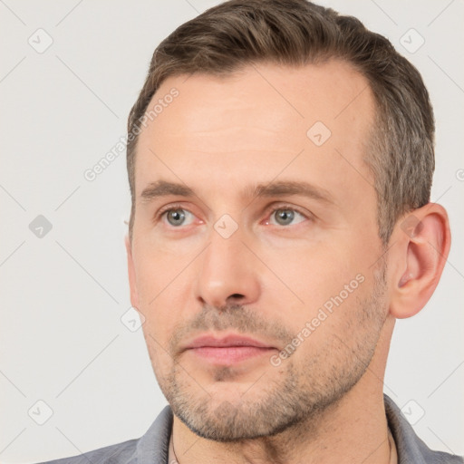 Neutral white adult male with short  brown hair and brown eyes