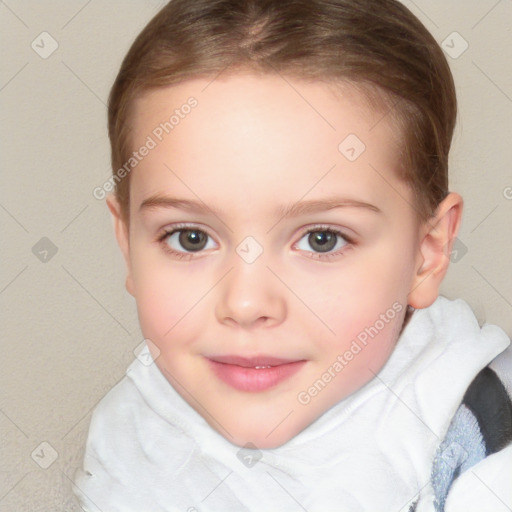 Joyful white child female with short  brown hair and brown eyes