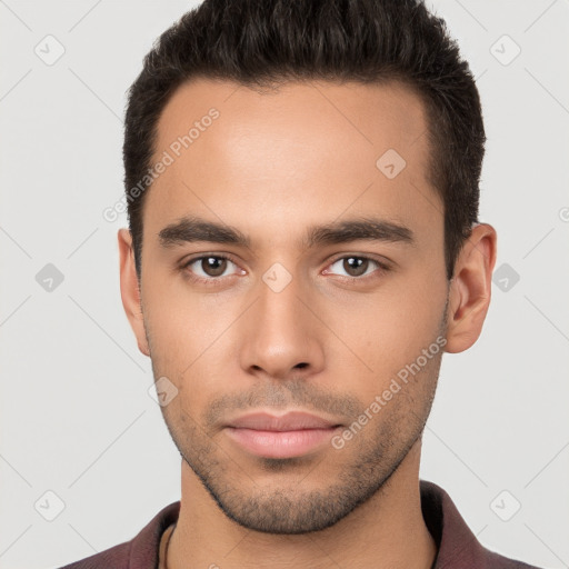 Neutral white young-adult male with short  brown hair and brown eyes