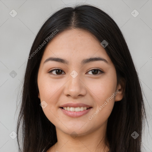 Joyful asian young-adult female with long  brown hair and brown eyes