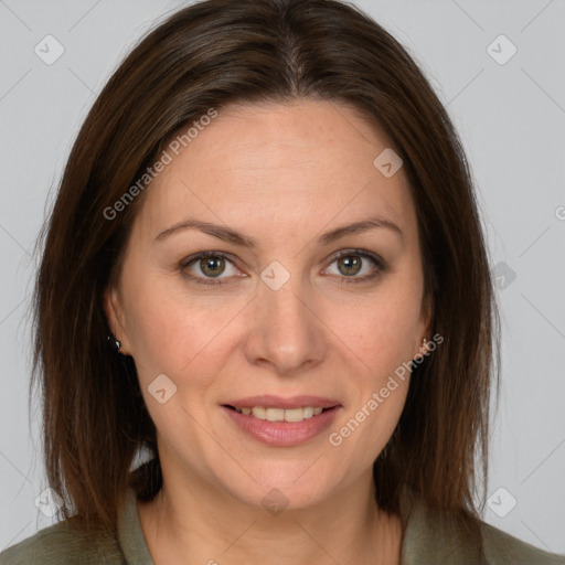 Joyful white adult female with medium  brown hair and grey eyes