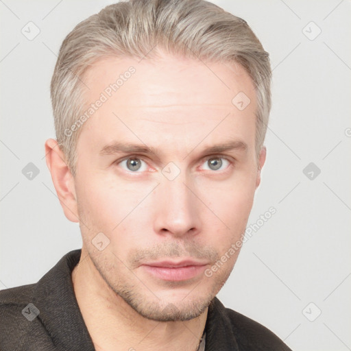 Neutral white young-adult male with short  brown hair and blue eyes