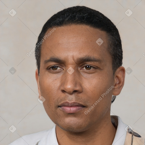 Neutral latino young-adult male with short  black hair and brown eyes