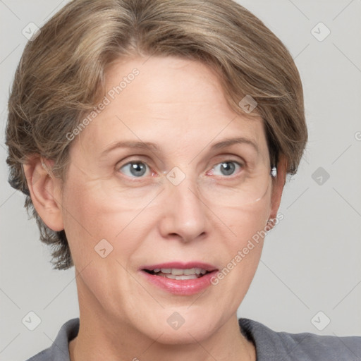 Joyful white adult female with medium  brown hair and grey eyes