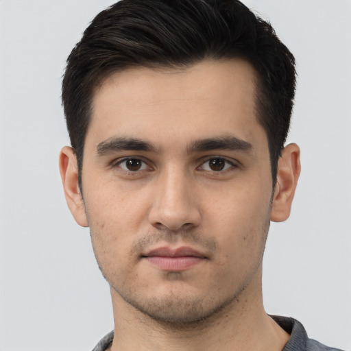 Neutral white young-adult male with short  black hair and brown eyes