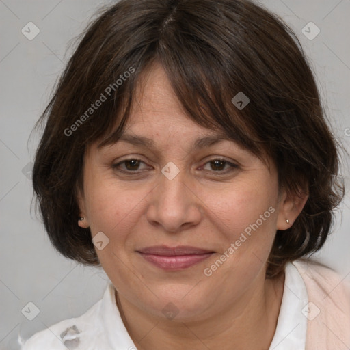 Joyful white adult female with medium  brown hair and brown eyes