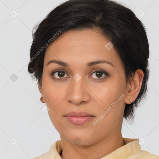 Joyful latino young-adult female with short  brown hair and brown eyes