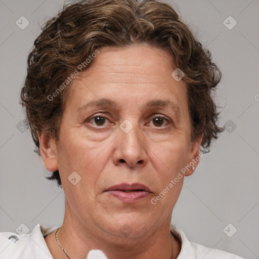 Joyful white adult female with short  brown hair and brown eyes