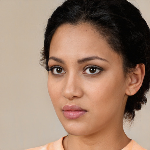 Neutral latino young-adult female with medium  brown hair and brown eyes