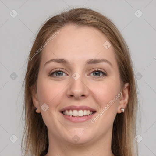 Joyful white young-adult female with long  brown hair and grey eyes