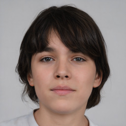 Neutral white child female with medium  brown hair and brown eyes