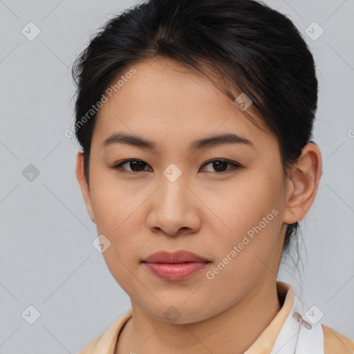 Joyful asian young-adult female with medium  brown hair and brown eyes