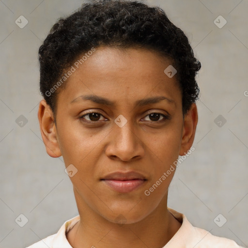 Joyful black young-adult female with short  brown hair and brown eyes