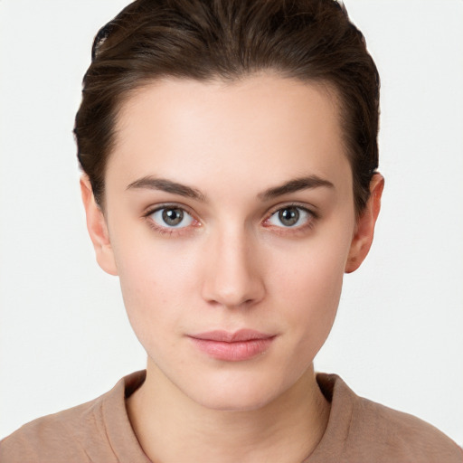 Neutral white young-adult female with short  brown hair and brown eyes