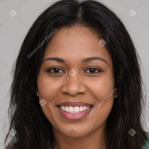 Joyful latino young-adult female with long  brown hair and brown eyes